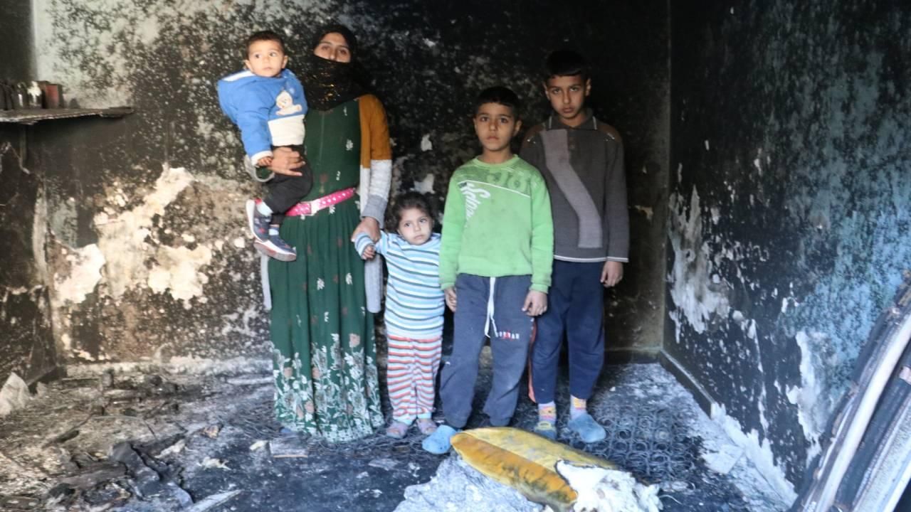 Adana'da 11 yaşındaki çocuk 2 yaşındaki kardeşini yangından kurtardı